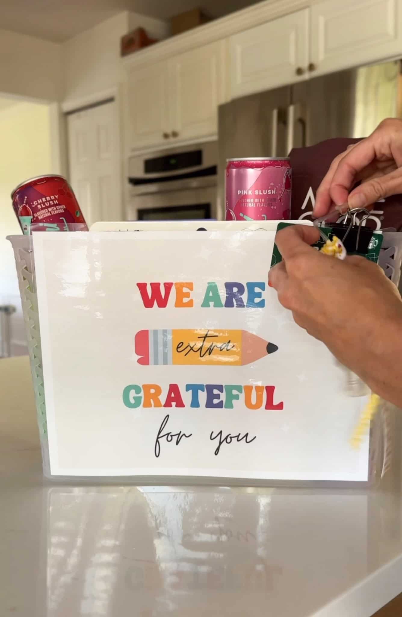 back to school teacher gift idea - basket filled with supplies and sign on front that says we are extra grateful for you